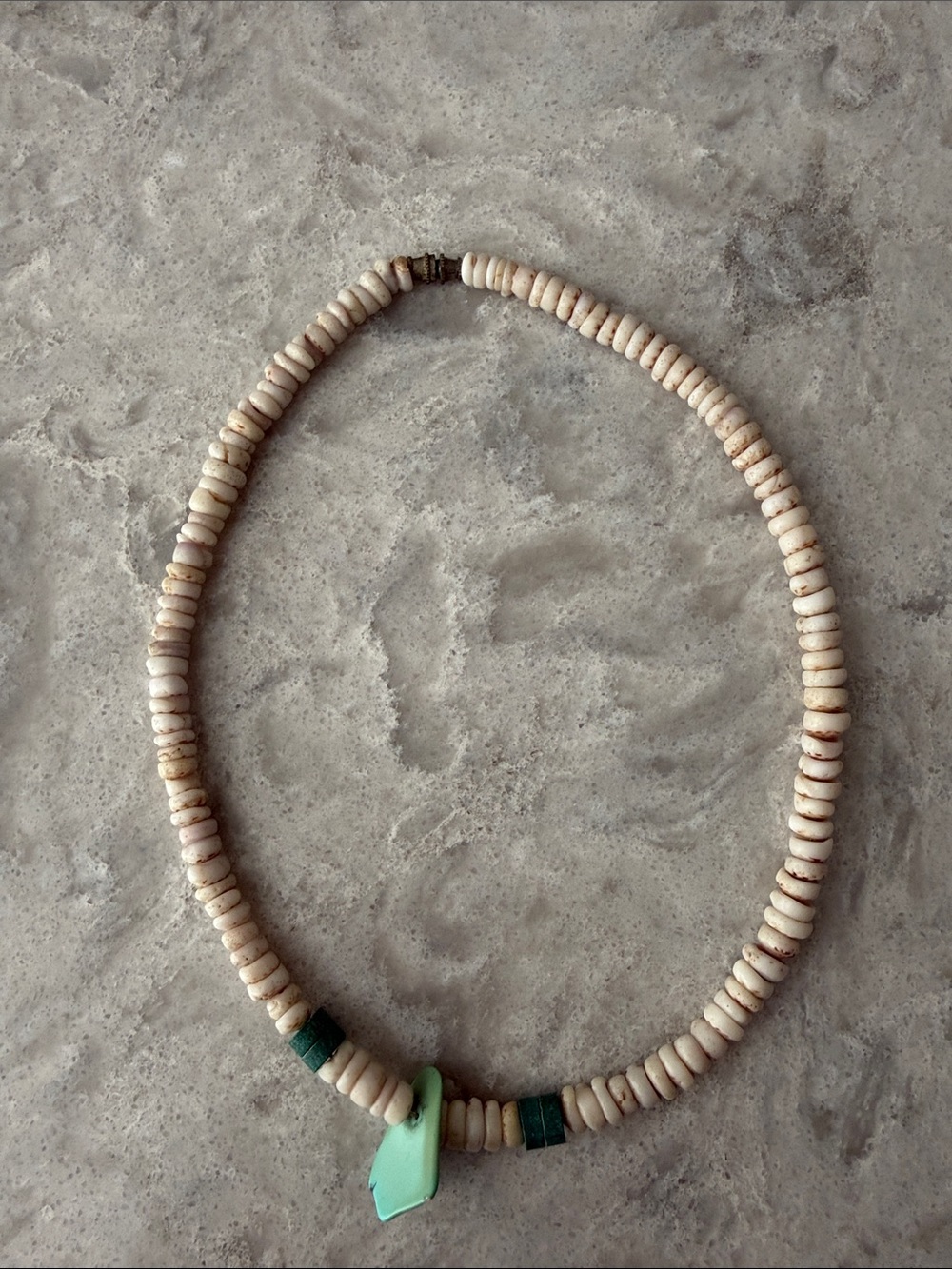 Vintage Puka Shell necklace with Turquoise color stone and blue beads.